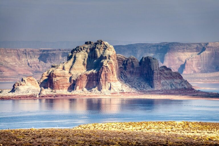 Low water levels at Lake Powell showing the reservoir's exposed shoreline and declining supply.